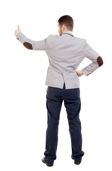 Back view of  business man shows thumbs up. — Stock Photo, Image