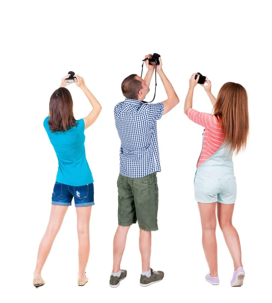 Back view group of people photographed attractions. — Stock Photo, Image