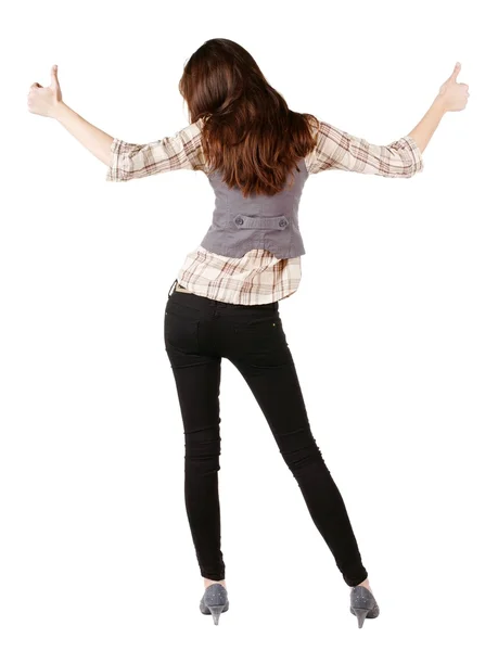 Vista posterior de hermosa mujer morena en jeans — Foto de Stock