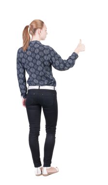 arka başparmak gösterilen görünüm ayakta genç Kızıl saçlı kadın