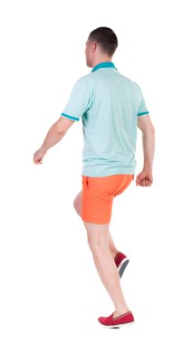 arkadan görünüşü çalışan sporcu.