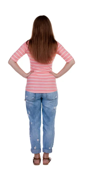Standing woman in jeans Back view — Stock Photo, Image