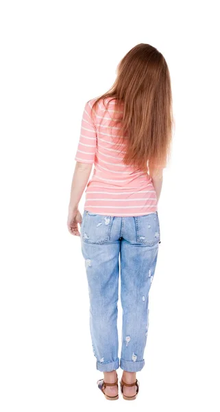 Staande vrouw in jeans achteraanzicht — Stockfoto