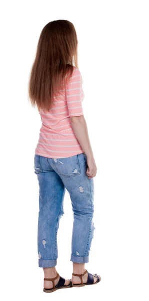 Walking woman in jeans Back view — Stock Photo, Image