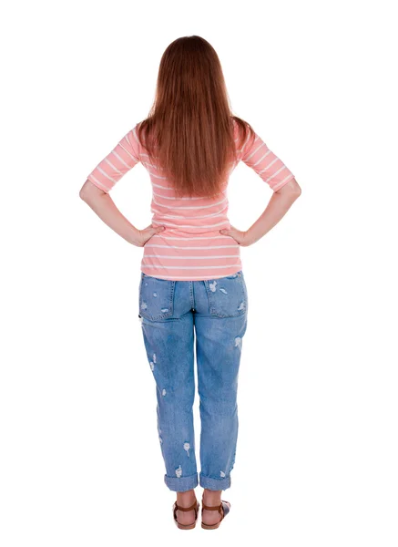 Standing woman in jeans Back view — Stock Photo, Image