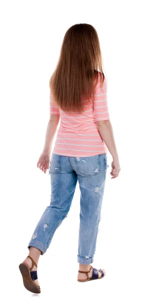 Ходьба жінка в джинсах Вид ззаду — стокове фото