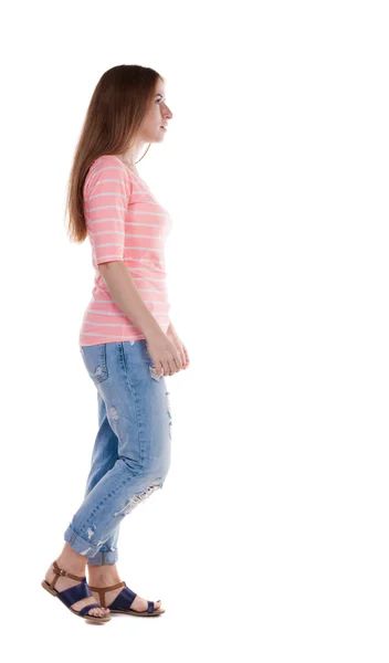 Walking woman in jeans Back view — Stock Photo, Image