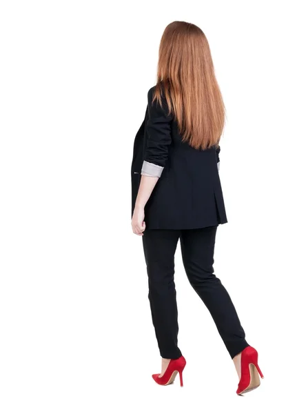 Gyalogos üzleti nő hátsó nézet — Stock Fotó