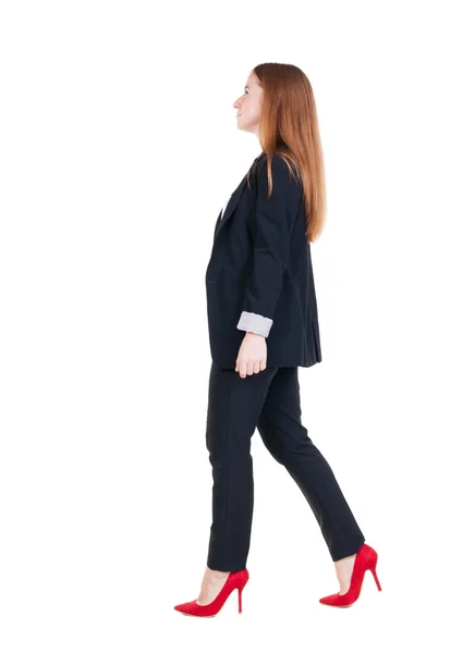 Walking red head business woman. — Stock Photo, Image