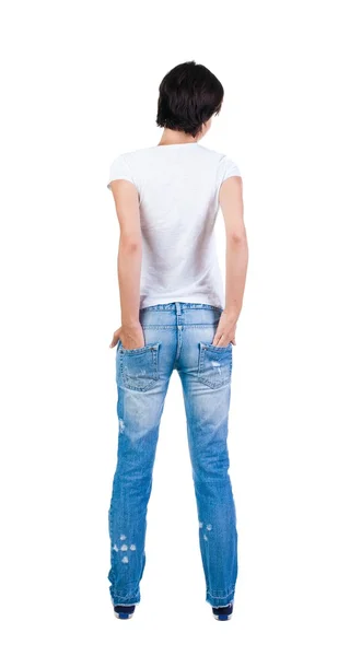 Женщина стоя в вид сзади джинсы — стоковое фото