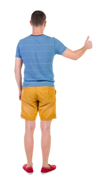Back view of  man  shows thumbs up. — Stock Photo, Image