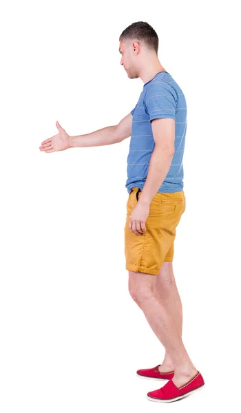 Mannen i shorts handslag. — Stockfoto