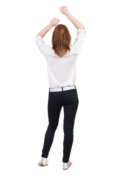 Happy woman with hands up Back view — Stock Photo, Image