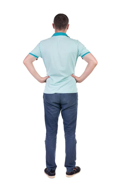 Vista posterior de hombre guapo en camiseta mirando hacia arriba. — Foto de Stock