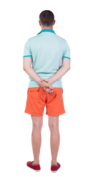 Bakifrån av stilig man i shorts — Stockfoto