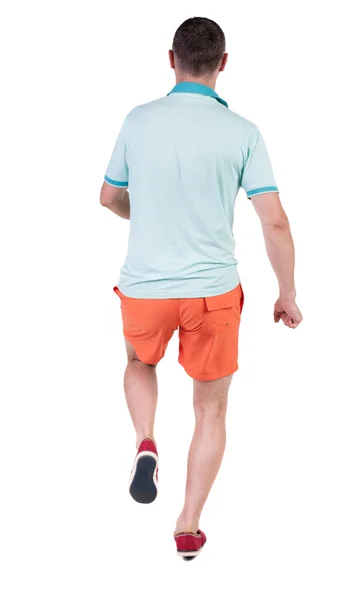 Achteraanzicht van lopende sportman. — Stockfoto