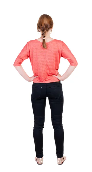 Mulher em pé em jeans vista traseira — Fotografia de Stock