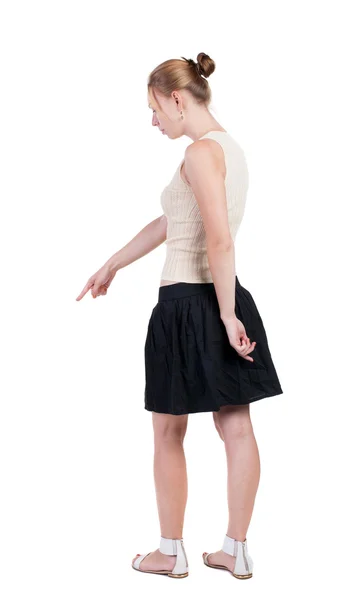 Back view of  pointing woman. — Stock Photo, Image