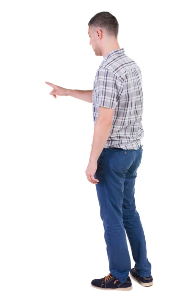 Vista posterior de hombres jóvenes señalando en camisa y jeans . — Foto de Stock