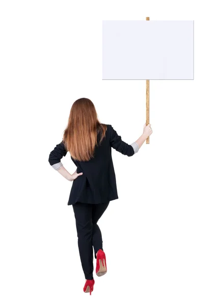 Back view business woman showing sign board. Royalty Free Stock Images