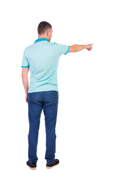 Widok wskazując młodych mężczyzn koszula i jeansy z tyłu. — Zdjęcie stockowe