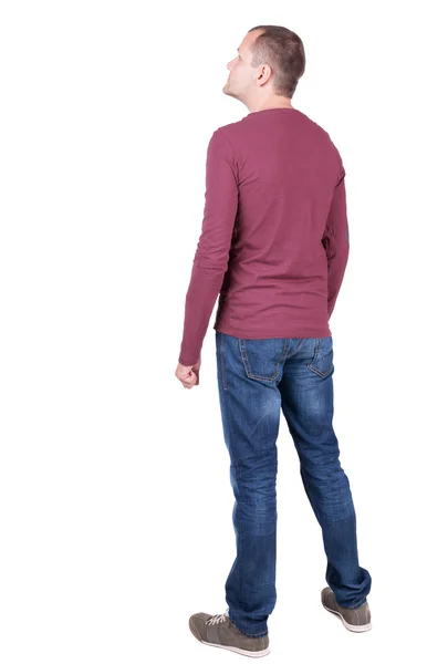 Back view of man in t-shirt and jeans — Stock Photo, Image