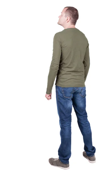 Zadní pohled na člověka v tričku a džínách — Stock fotografie