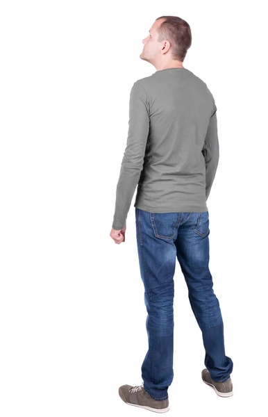 Vista posteriore dell'uomo in maglietta e jeans — Foto Stock