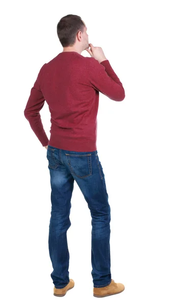 Pohled zezadu na pohledný muž, v červený svetr. — Stock fotografie