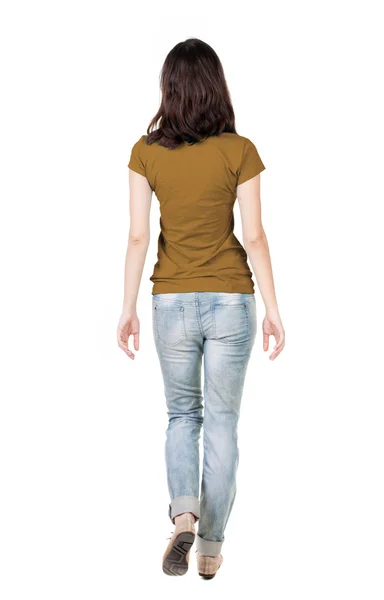 Вид ззаду жінки в джинсах і футболці — стокове фото