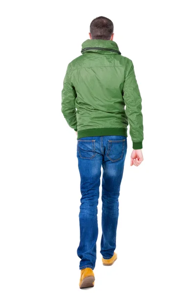 Bakifrån av man i jeans och jacka. — Stockfoto