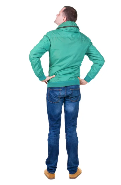 Вид сзади человека в зеленых ветровки — стоковое фото