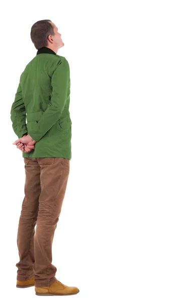 Zadní pohled na člověka v zelené bundě — Stock fotografie