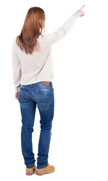 Mulher de camisa apontando para longe — Fotografia de Stock