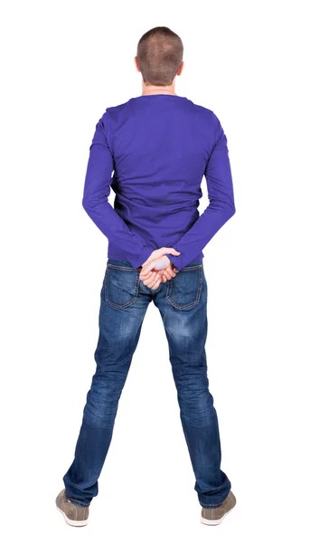 Back view of man in shirt and jeans — Stock Photo, Image
