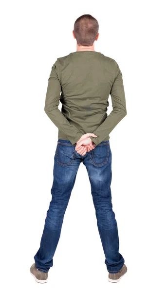 Achteraanzicht van man in het shirt en spijkerbroek — Stockfoto