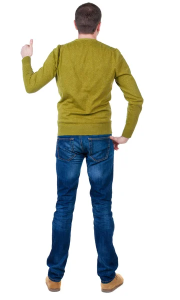 Muž v svetr ukazuje palec — Stock fotografie