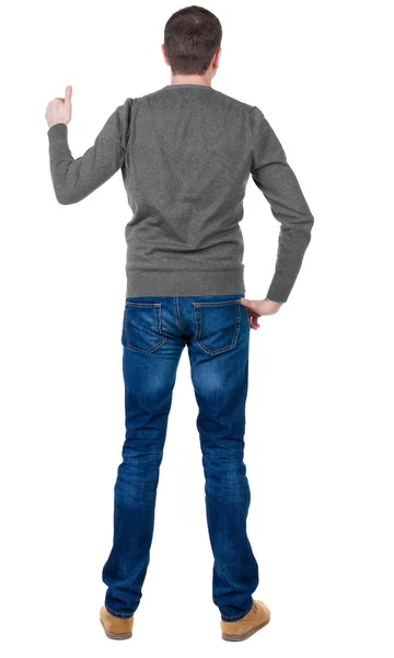 Człowiek w sweter pokazuje kciuk — Zdjęcie stockowe