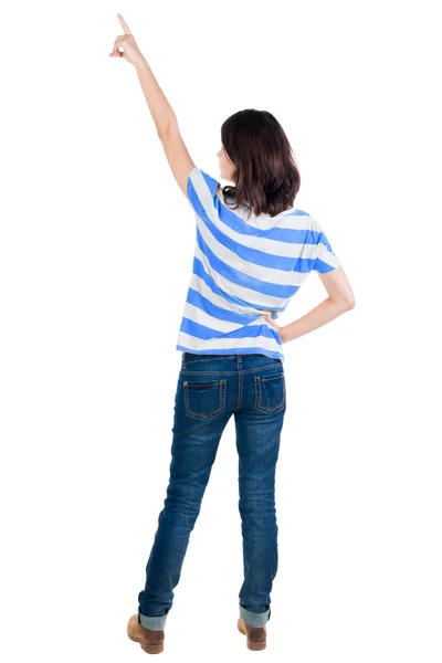 Brunett kvinna pekar uppåt — Stockfoto