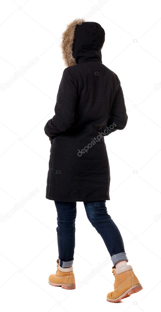 Woman walking in winter jacket