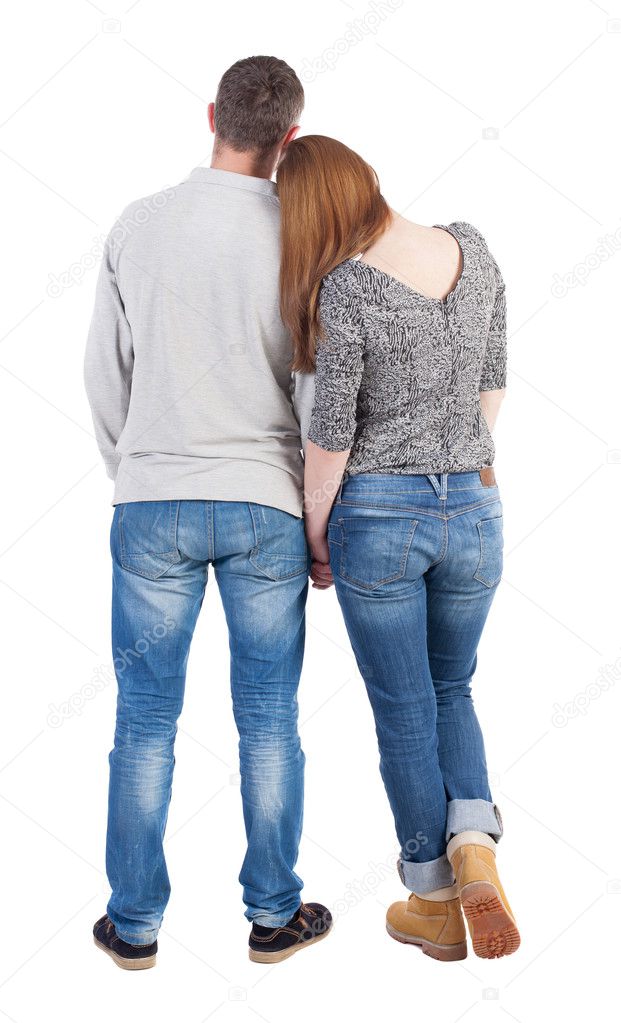 Couple standing and holding hands