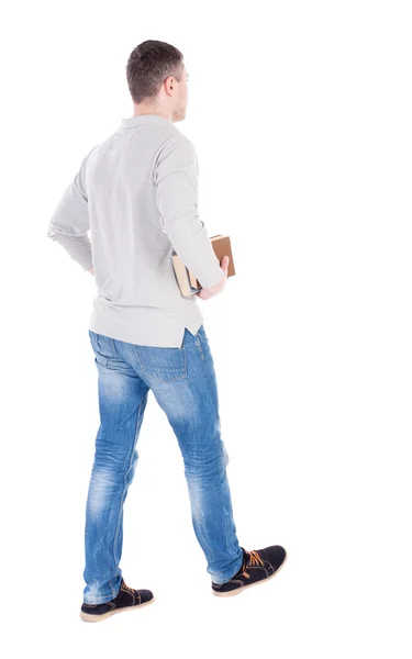 Man carries stack of books — Stock Photo, Image