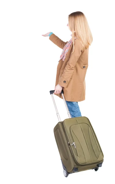 スーツケースを持ってコートの女 — ストック写真