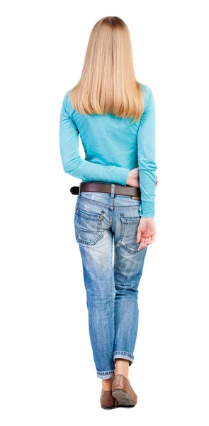 Young woman in blue shirt and jeans — Stock Photo, Image
