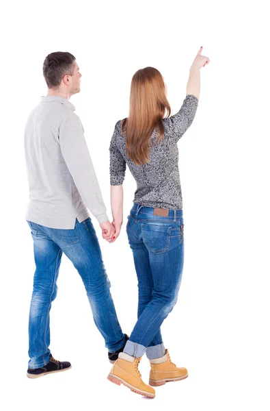 Back view of walking young couple — Stock Photo, Image