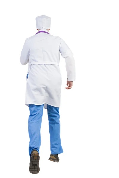 Achteraanzicht van lopende doctor in een gewaad — Stockfoto