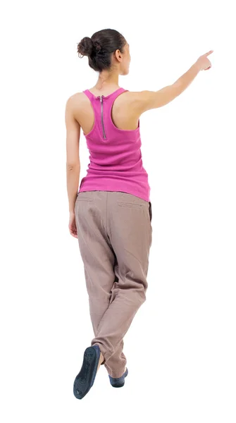 Back view of  pointing woman — Stock Photo, Image