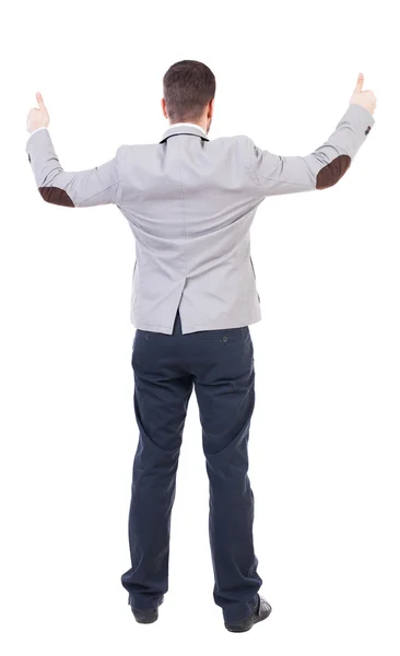 Back view of  businessman shows thumbs up. — Stock Photo, Image