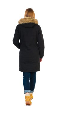 walking  woman in parka.