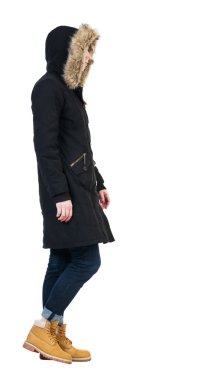 walking  woman in parka.